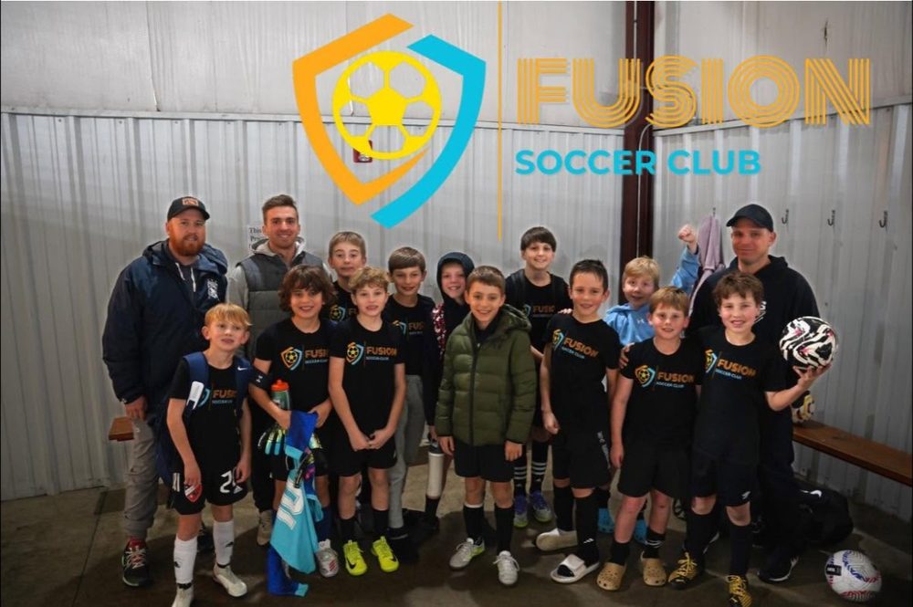 Fusion players and coaches after an indoor session